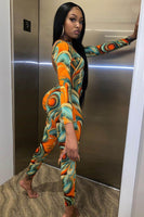 Orange Abstract Print Round Neck Long Sleeve Backless Jumpsuit